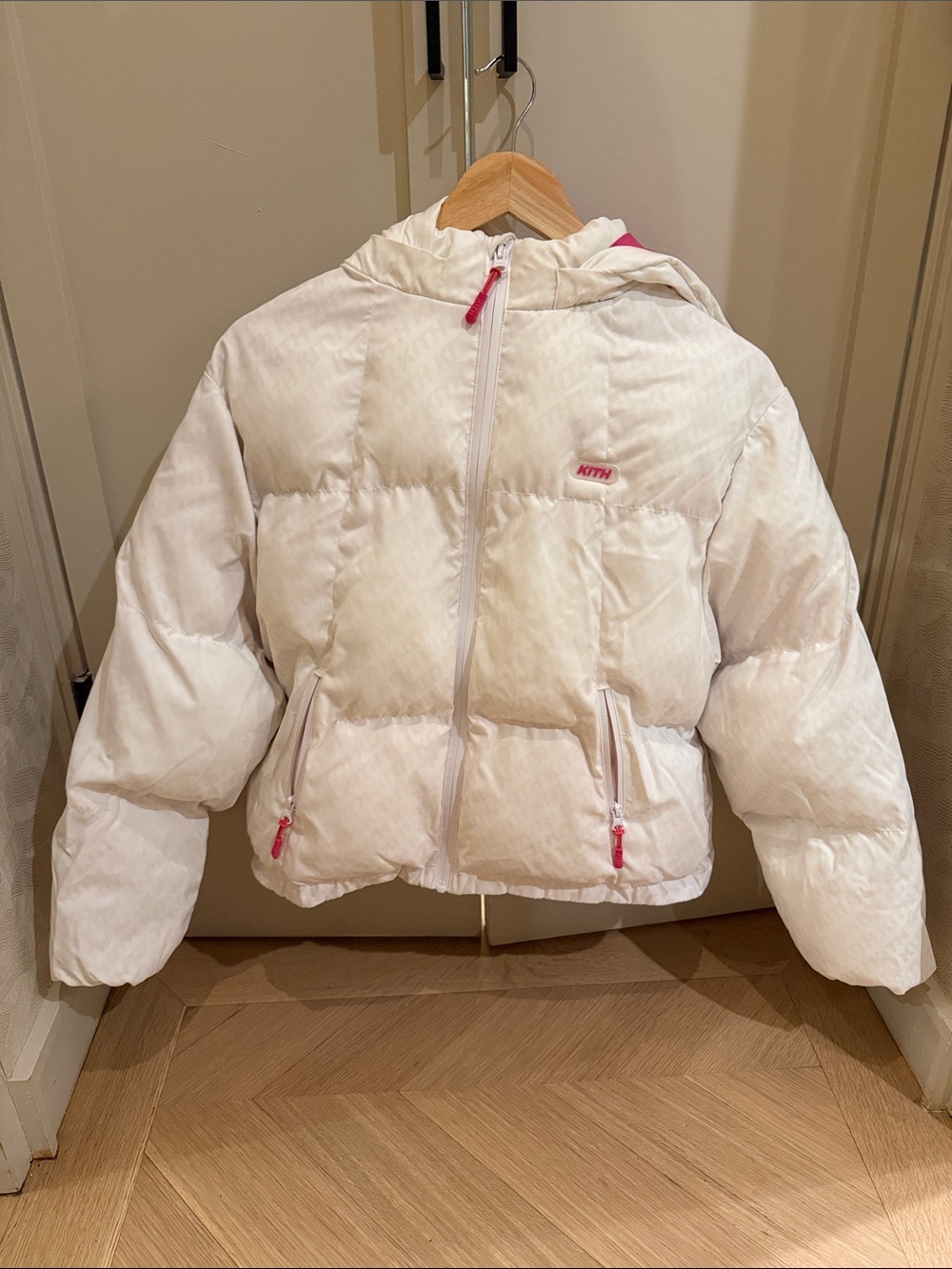 Kith White Kids Hooded Puffer Jacket with Pink accents